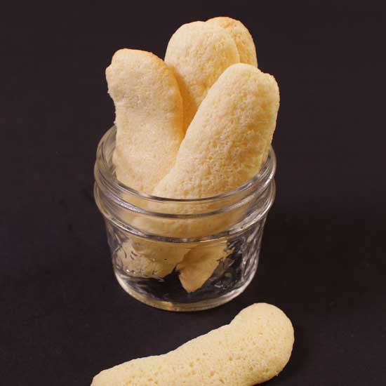 four ladyfingers in a glass jar.