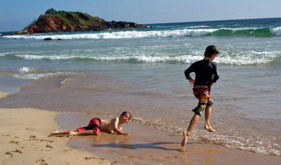 Sri Lankas southern beach. This one is Mirissa. boys playing at Mirissa.