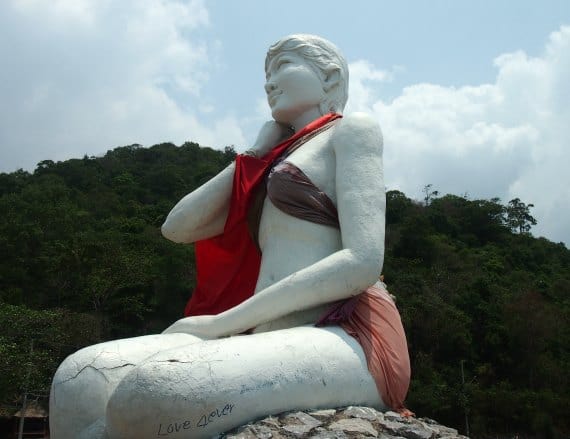 This statue at Kep, Cambodia, the white lady, is regularly dressed by locals to protect her modesty.