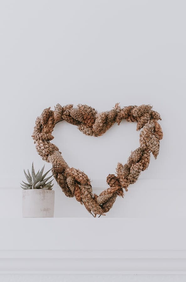 DIY Pinecone Wreath - make this pretty pinecone wreath for every season! Click through to get the tutorial and some helpful tips #wreaths #wreathmaking #diyhomedecor #homedecorideas