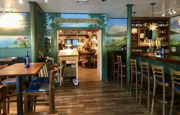 The bar and dining room of the comfortable Blue Mingo restaurant on Otsego Lake.
