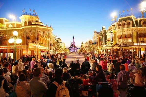 Disney parades draw crowds and often leave the rides empty.