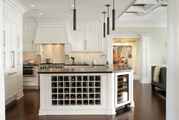 mix white wine rack with stainless appliances for a fun and modern kitchen