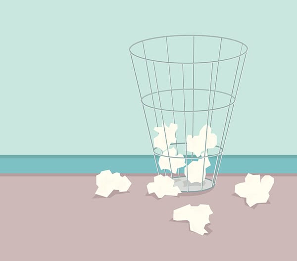 waste basket with crumpled paper