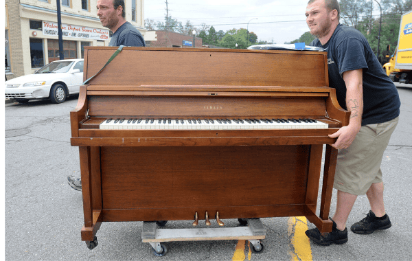 move a piano on road