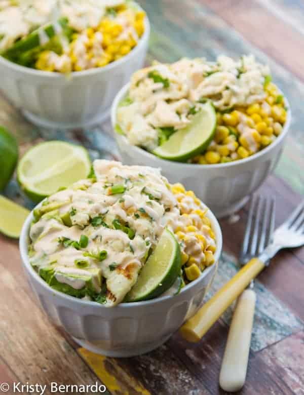 Fish Taco Salad with a Creamy Chipotle Dressing healthy fish taco salads! SO good - you'll never think about all the great nutrients & omega-3's you're getting! | www.thewickednoodle.com | #salad #healthy #fish