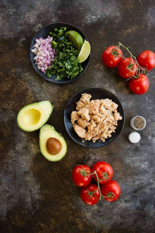Mexican Tuna Salad Stuffed Avocados Mexican Tuna Salad Stuffed Avocados - just a few ingredients, super healthy and it tastes sooo good! You can also use tomatoes (or both)!