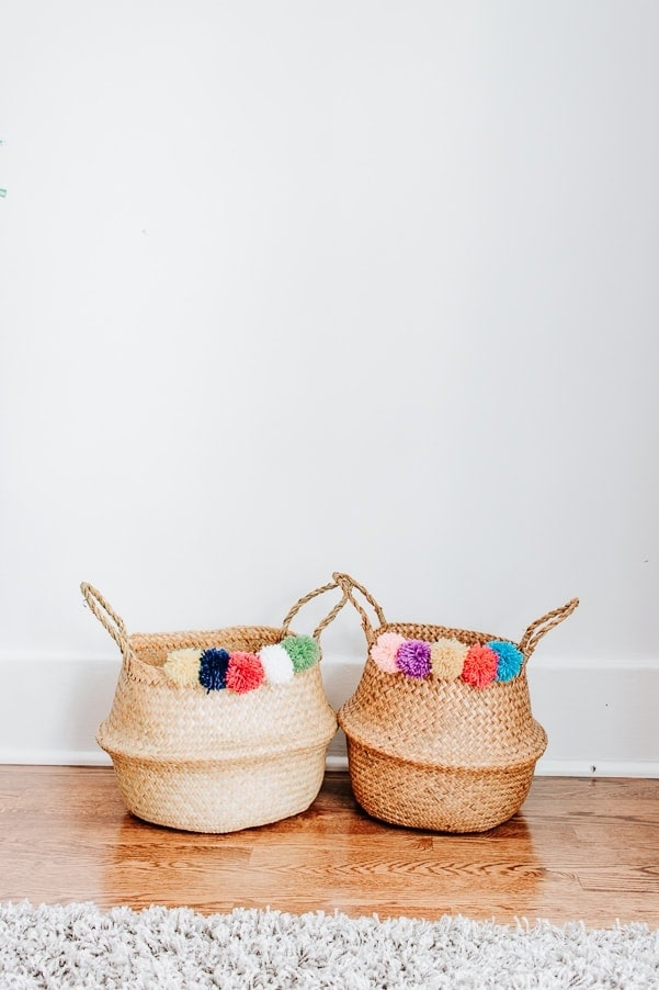 Make this DIY Pom Pom Belly Basket with just a few inexpensive materials! #diy #pompoms
