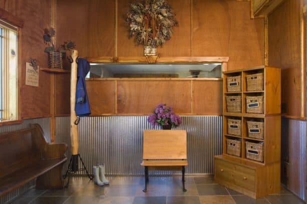 corrugated metal paneling in a rustic entry