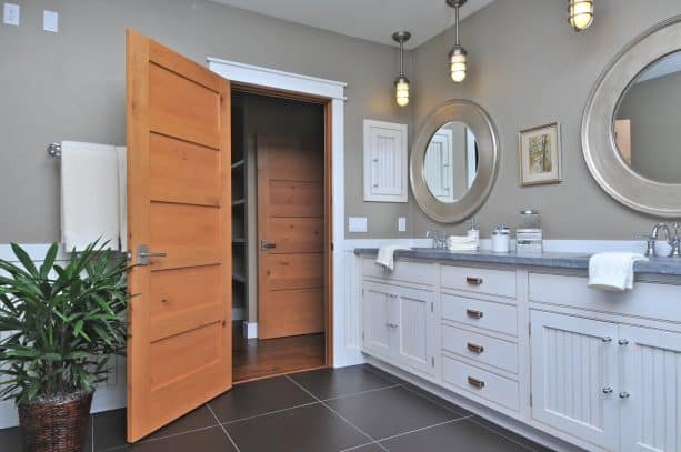 a wood door which frame is not painted in white as the trim