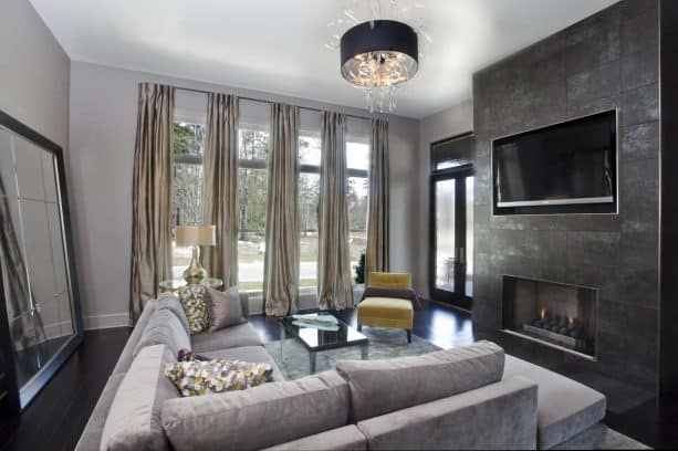 grey living room with mustard chair