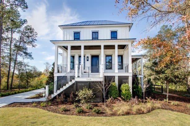 a lace-white siding paired with grey trim in a traditional exterior