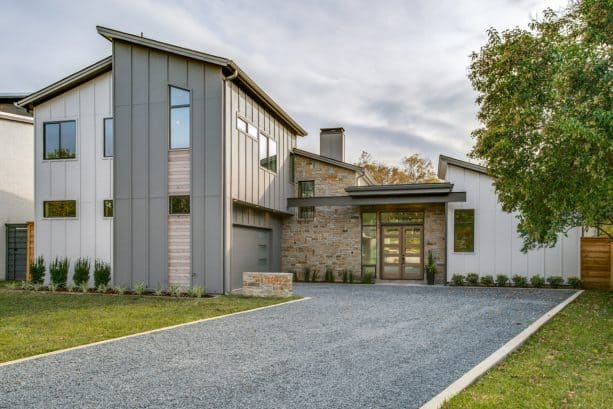 a mixture between transitional and farmhouse exterior with Gauntlet Gray SW 7019 paint color