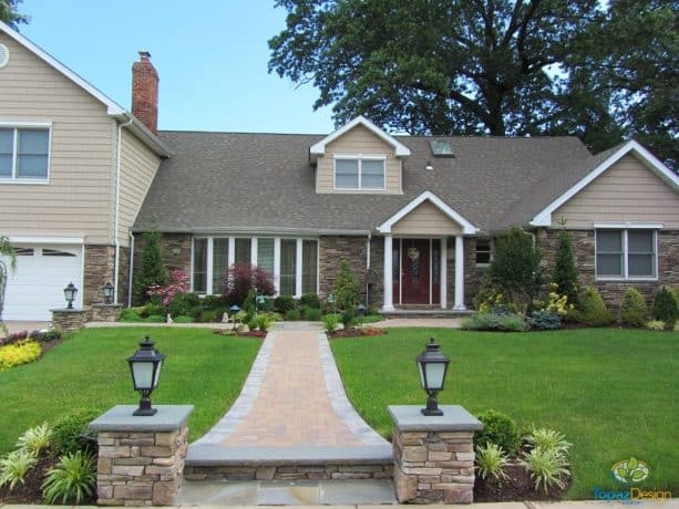 red brick front walkway landscaping idea with simply grey paver edges as highlight