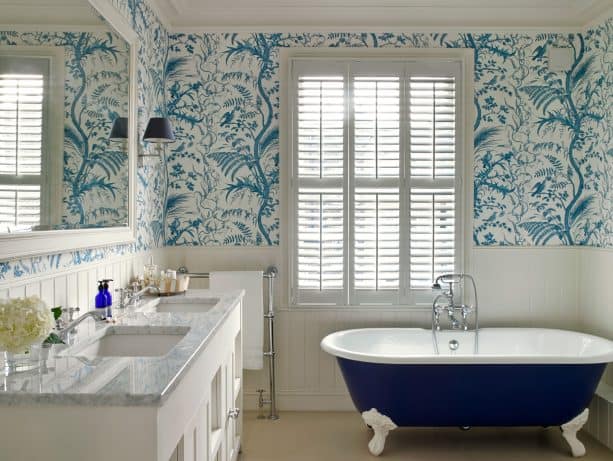 bathroom with navy blue coated clawfoot tub