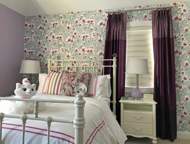 a gorgeous transitional girl’s bedroom with deep pink, purple, grey, and white colors