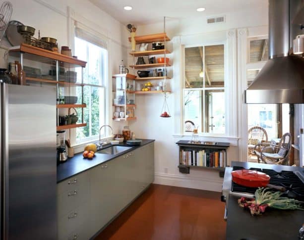a small kitchen with indoor window for creating a more open atmosphere
