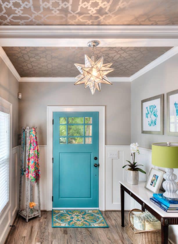 traditional entry with sapphire blue wall and white trim paint color