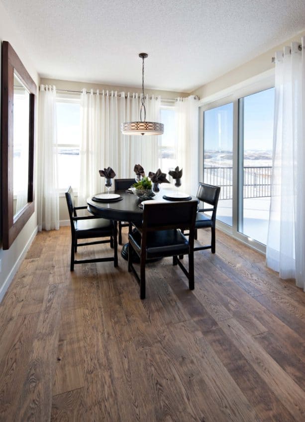 dining room sliding glass doors with chrome rods and sheer curtains