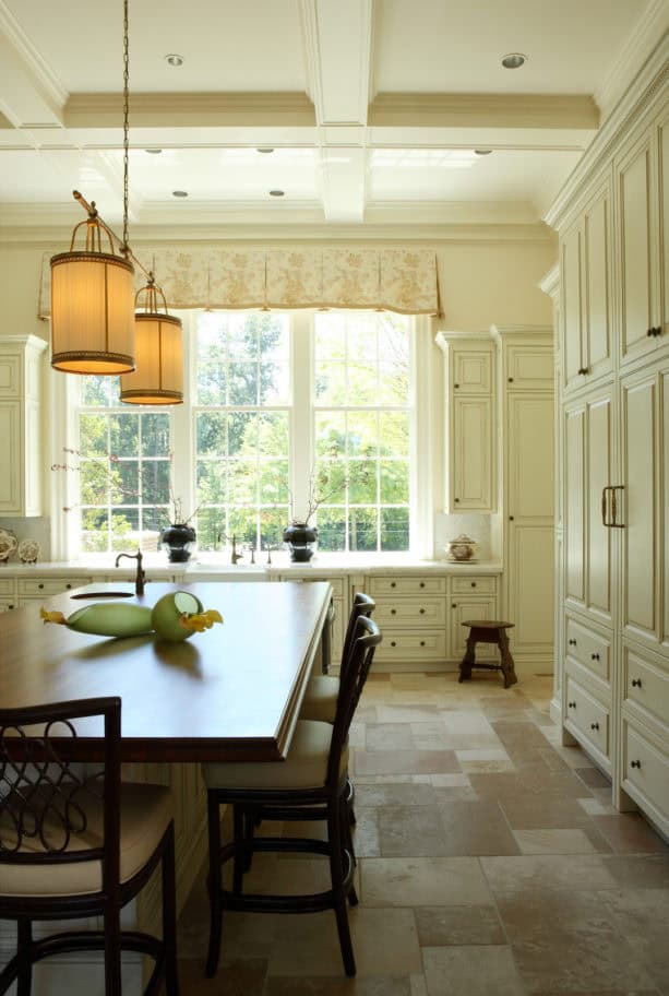 floor to ceiling raised-panel cabinets in benjamin moore mayonnaise color