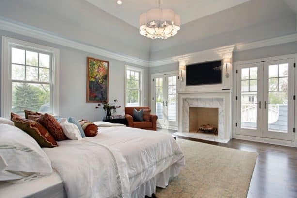 contemporary master bedroom with Benjamin Moore Pebble Beach 1597 wall paint color
