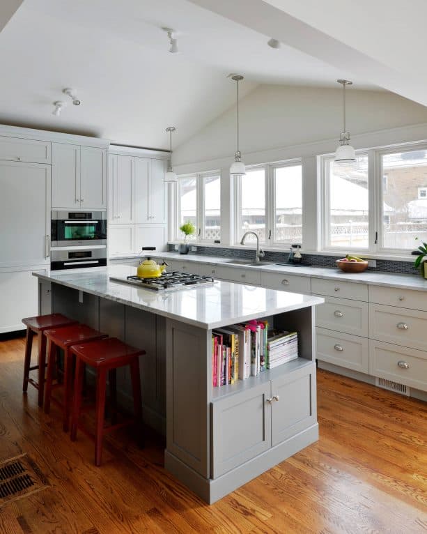 kitchen island with built-in bookshelf painted in Sherwin-Williams big chill SW 7648