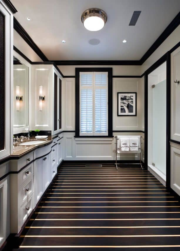 traditional bathroom design with white glass shower room door and black interior trim paint color