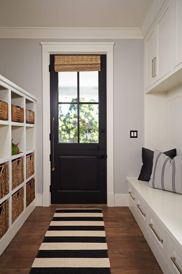 transitional entry with black door and white trim paint color