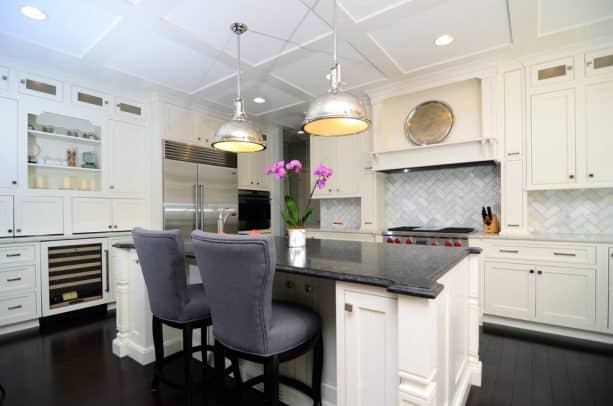 contemporary kitchen with antique white cabinets and stained brazilian cherry hardwood flooring
