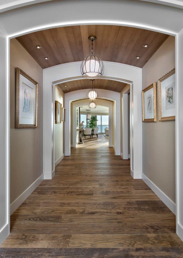 beige hallway with archways feature