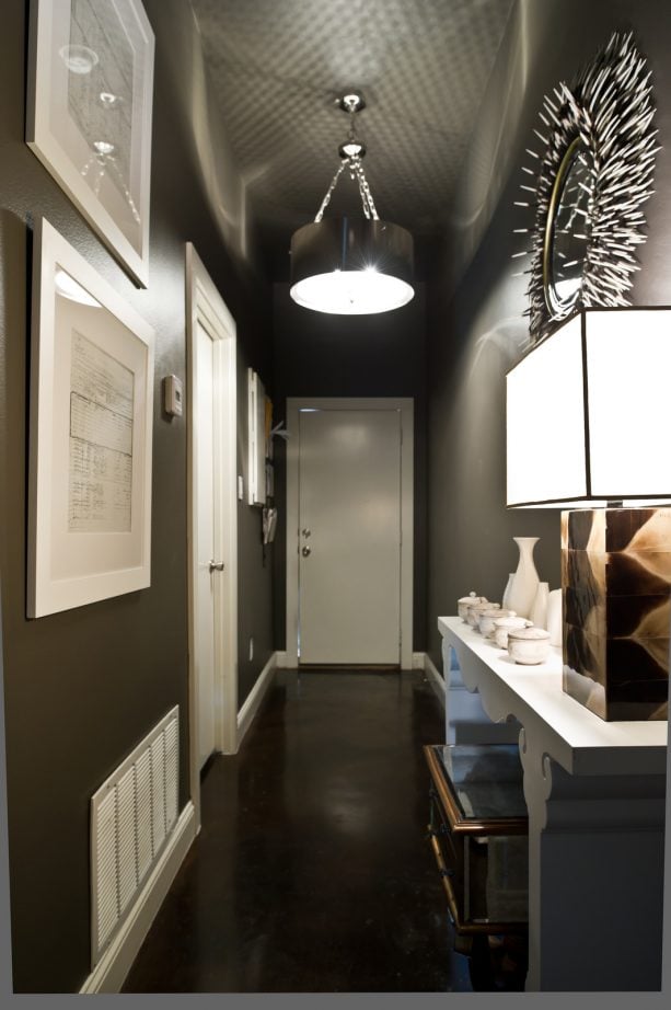 black hallway with white trim