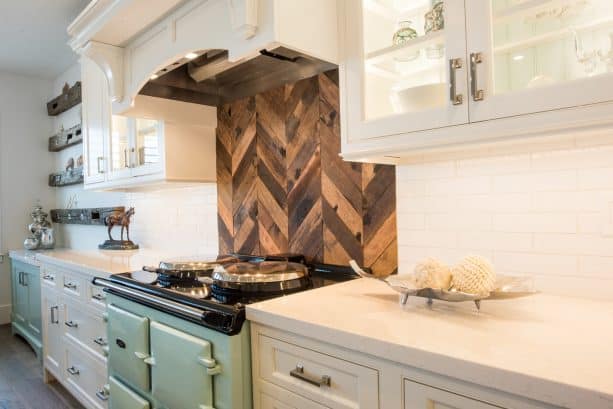 herringbone wood behind-stove backsplash