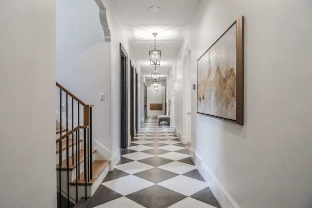 black and white porcelain checkered floor in a hall