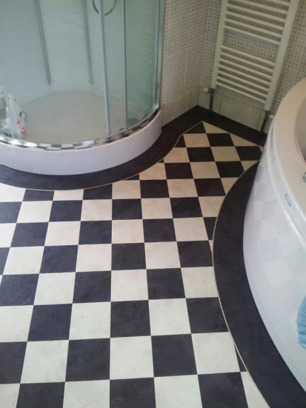 black and white vinyl floor in a bathroom