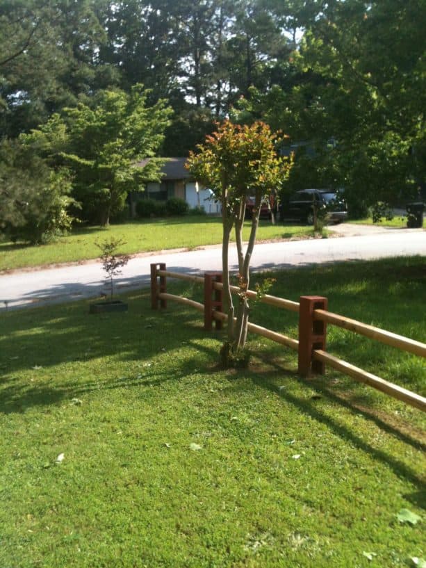 a very simple fence from cinder block and wood