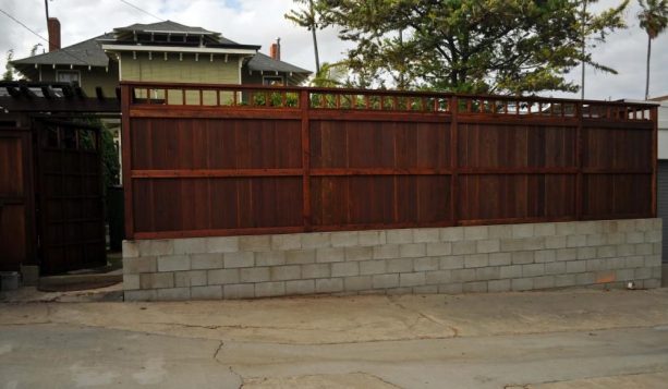 cinder block base for a wooden fence