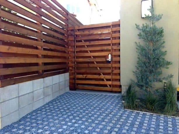 good-looking yet cheap fence from cinder block and wood
