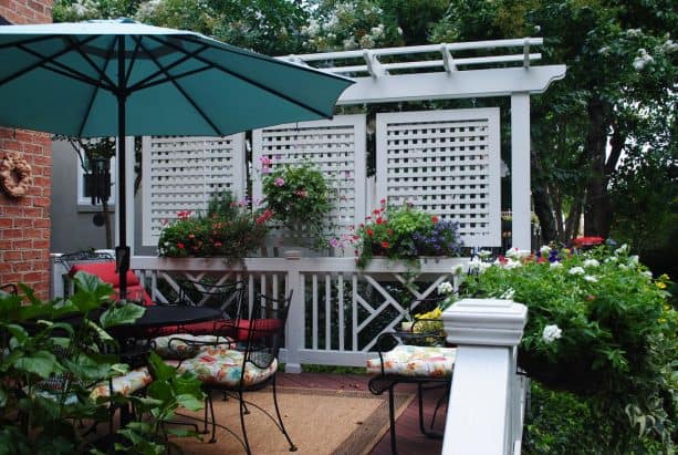 eclectic deck with hanging privacy screens
