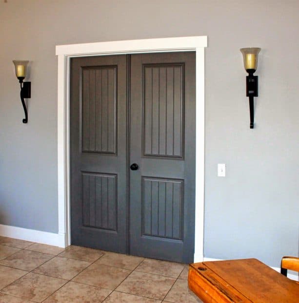 barn-style doors with grey stain and white trims