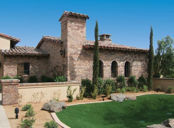 brick tile to remodel a house exterior to have the look of authentic stone brick