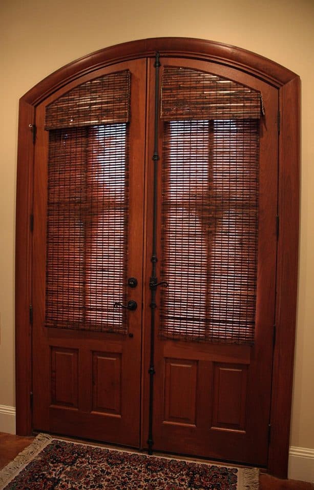arched half glass doors with custom bamboo blinds