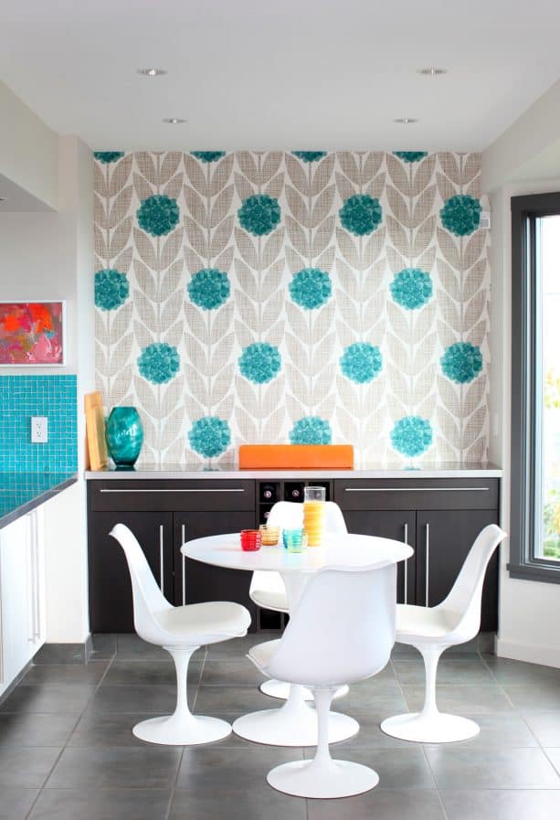 accentuating light grey and turquoise wallpaper in a contemporary dining room