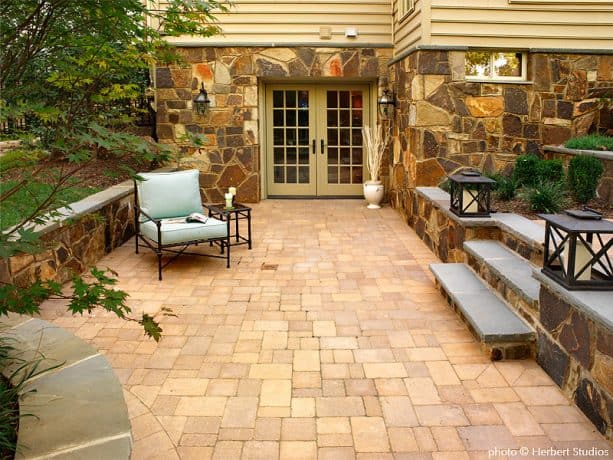 a sunken-style walkout basement patio with stairs