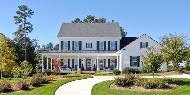 a white house with black shutter for filling the empty exterior wall