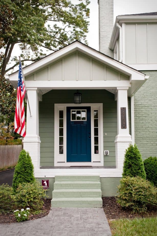 a craftsman entry with Sherwin Williams Rainstorm door