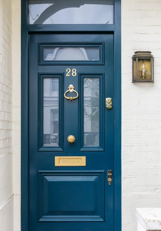a transitional front door with Hague Blue paint