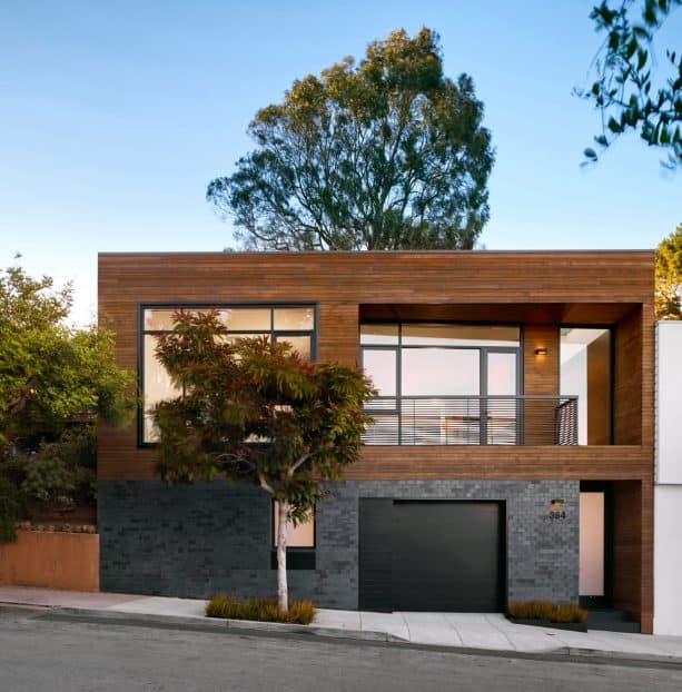 build a stylish exterior with half grey brick and half wood siding