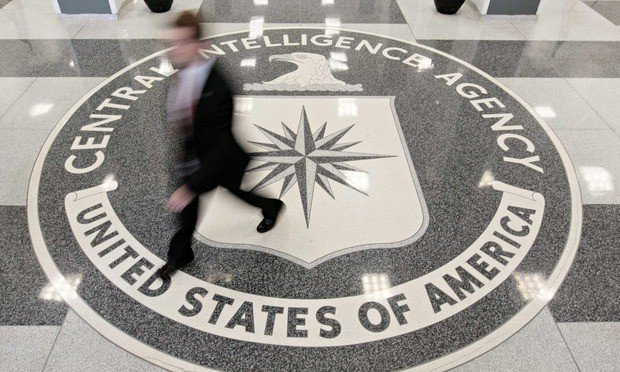 Image of a blurred 'spook' walking through the entrance at CIA Headquarters Building in McLean, Virginia Photo of a blurred 'spook' walking through the entrance at CIA Headquarters Building in McLean, Virginia