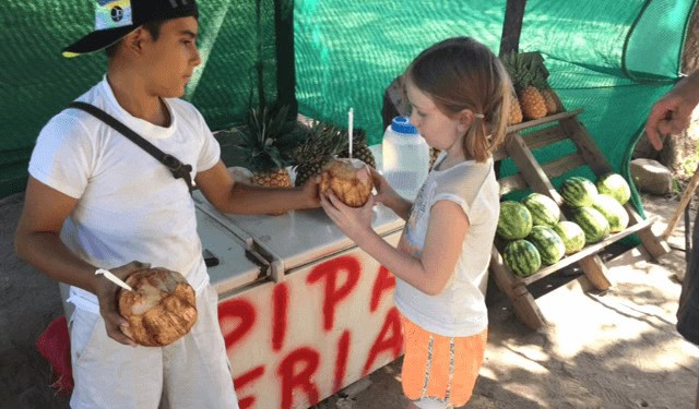 Fresh coconut is a great kids treat in costa rica