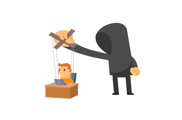 social-engineering An illustration of a man in a hoodie using puppet strings on a man sat at a desk.
